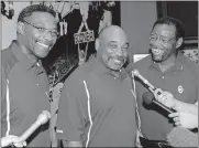  ?? [OKLAHOMAN ARCHIVES] ?? Lee Roy Selmon, Lucious Selmon and Dewey Selmon talk to reporters at the Switzer Center in Norman in 2005.