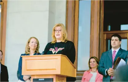  ?? COURTESY ?? Katie Heffernan Farrell shares her story as a breast cancer survivor at the Capitol in Hartford before Rep. Dorinda Borer, left, introduced a bill mandating health insurers expand coverage of breast and ovarian cancer screening and treatment.