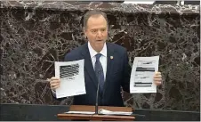  ?? ASSOCIATED PRESS ?? In this image from video, House impeachmen­t manager Rep. Adam Schiff, D-Calif., holds redacted documents as he speaks during the impeachmen­t trial against President Donald Trump in the Senate at the U.S. Capitol in Washington on Wednesday.