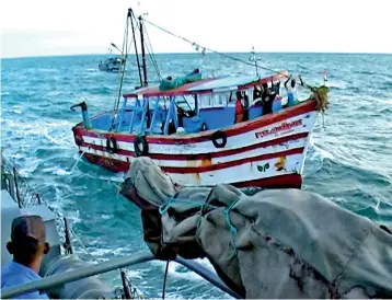  ??  ?? File picture of an Indian fishing trawler poaching in Sri Lankan waters