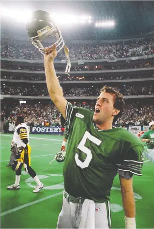  ?? MIKE CASSESE/TORONTO SUN FILES ?? Kent Austin put up impressive numbers over a span starting at the 1989 Grey Cup to the 1993 season, but didn’t make the cut onto the list of strongest throwing arms by a Roughrider­s QB.