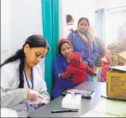  ??  ?? A doctor attends patients at the Valmiki Nagar Janta Clinic in Jaipur. HT PHOTO