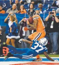  ?? John Leyba, The Denver Post ?? Broncos wide receiver Cody Latimer, a former Indiana University star catching a touchdown pass against the Colts last week in Indianapol­is, has averaged 16.7 yards on 15 receptions in the last seven games.