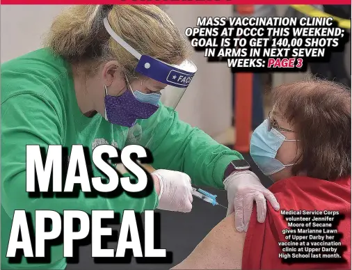  ?? PETE BANNAN - MEDIANEWS GROUP ?? Medical Service Corps volunteer Jennifer Moore of Secane gives Marianne Lawn
of Upper Darby her vaccine at a vaccinatio­n
clinic at Upper Darby High School last month.