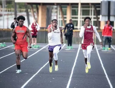  ?? (Photo courtesy of El Dorado News-times) ?? Arkansas High’s Telly Wells, right, runs during an event Wednesday, March 16, 2023, during the Oil Belt Relays in El Dorado, Ark. Wells took second in the 200-meter dash, where he placed second with a blazing time of 22.44, which qualifies him for the state meet.