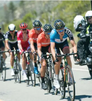  ??  ?? below Britton, in the most courageous rider jersey, leads the group in the 2017 Tour of California