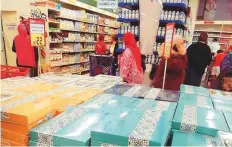  ??  ?? A hike in prices of Milad sweets has curtailed Egyptians’ urge to splurge on a centuries-old tradition of buying and gifting sweets to celebrate Milad Al Nabi.