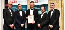  ??  ?? Photograph­ed receiving the award at the dinner in the Shelbourne from ACEI President, Tom Horan, are Sean Molloy, David Kiely, Conor McCarthy, and John McElvaney.