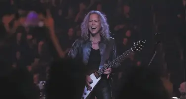  ?? Nick Otto / Special to The Chronicle 2019 ?? Metallica guitarist Kirk Hammett performs with the San Francisco Symphony during a concert that was the first event held at Chase Center when the arena opened on Sept. 6 in San Francisco.