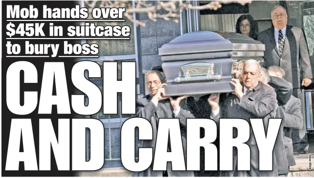  ??  ?? Staten Island funeral home workers carry out the body of Gambino boss “Franky Boy” Cali yesterday, while federal agents and cops tried to get a glimpse of reclusive members of the Mafia family inside. Sources say $45,000 in cash was handed over to lay the murdered don to rest in style.