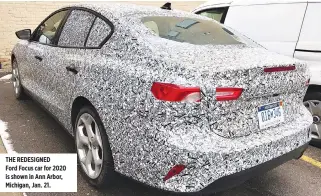  ??  ?? THE REDESIGNED Ford Focus car for 2020 is shown in Ann Arbor, Michigan, Jan. 21.