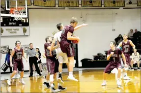  ?? MARK HUMPHREY ENTERPRISE-LEADER ?? Lincoln junior Caleb Hale stakes claim to this rebound versus West Fork. Hale had several key defensive boards during Lincoln’s 63-52 road victory at West Fork Friday. The Wolves host the District 4A-1 basketball tournament this week.