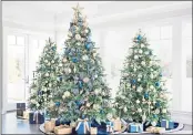  ?? PHOTO COURTESY OF BALSAM HILL ?? Blue is a trending color for holiday decoration­s in 2021, according to Balsam Hill.