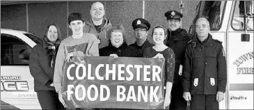  ?? JODY O’BRIEN PHOTO ?? Students from Cobequid Educationa­l Centre will be collecting non- perishable donations for the Colchester Food Bank today in support of the upcoming hockey game between the Truro police and Truro fire services. Joining in on a photo include, from left,...