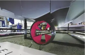  ??  ?? A B O V E The hull is made from a mix of flax and basalt fibres
L E F T RAD’S hubless rim drive is safer and more efficient giving a claimed 35nm range at 20 knots