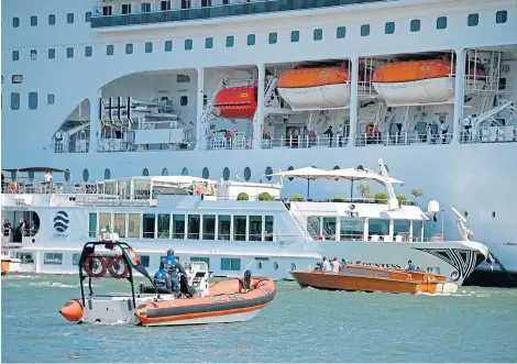  ?? Picture: AP. ?? The MSC Opera cruise ship after the collision with a tourist boat on the Giudecca Canal.