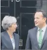  ??  ?? MEETING: Theresa May greets Irish Taoiseach Leo Varadkar ahead of the meeting at No 10.