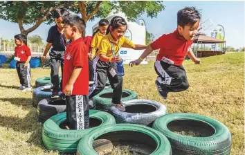  ??  ?? Al Khawaneej Walk fitness village features an inflatable children’s boxing ring and a play area.