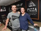  ?? Arnold Gold/Hearst Connecticu­t Media ?? Pasta Avest & Pizzeria owners Neco Lopez and his wife, Sarah, in the restaurant in Guilford on Feb. 21.