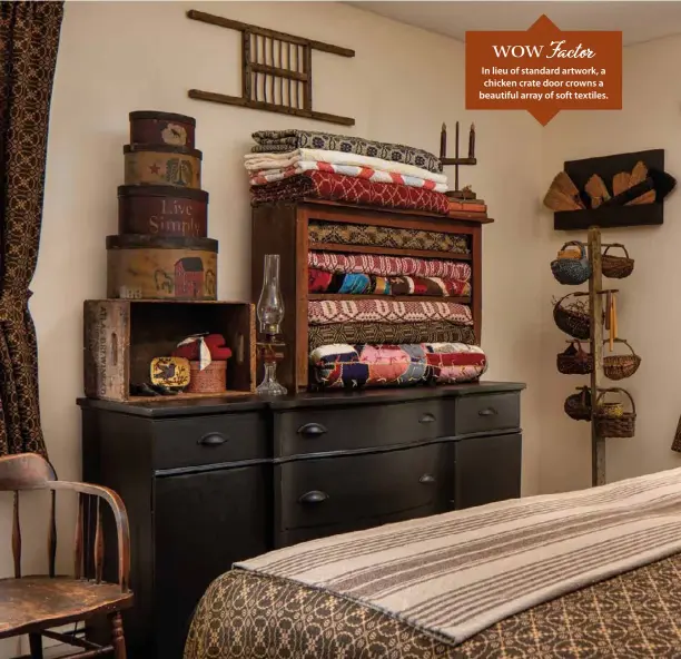  ??  ?? By painting a sideboard black and removing the doors from a cupboard, Jan created a focal point and storage area in the master bedroom. Stacked boxes and a rack adorned with woven baskets heighten the visual interest.