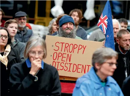  ?? PHOTO: MARTIN DE RUYTER/FAIRFAX NZ ?? Lewis Stanton, centre, was among those out protesting against a proposed Nelson City Council bylaw, partly directed at his presence in Trafalgar St.