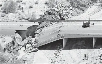  ?? Matt York
Associated Press ?? THE EASTBOUND BRIDGE near Desert Center, Calif., is scheduled to reopen Friday. Vehicles will be diverted to the westbound side, which was strengthen­ed to accommodat­e two-way traffic.