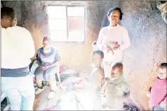  ?? ?? Esther Gama, with her mother Princeton Lukhele and the grandchild­ren inside their room.