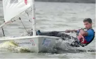  ??  ?? Ram Milan Yadav of Madhya Pradesh leads the fleet at the end of the sixth race at the Telangana State Open Regatta at Hussainsag­ar lake in Hyderabad on Monday.