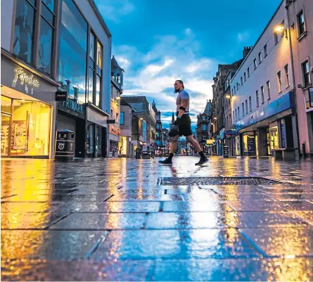  ??  ?? Above: A virtually deserted Perth High Street. Above right and below: Perth Bridge and Queen’s Bridge pictured in pre-covid times. Pictures: Steve Macdougall/kris Miller.