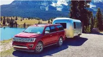  ??  ?? Larger families who spend their summers towing a camper trailer can make a more than fair case for owning a full-size SUV. FORD