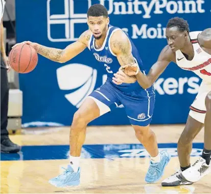  ?? CHARLIE NEIBERGALL/AP ?? Tremell Murphy and Drake face a critical weekend at the Missouri Valley Conference tournament in St. Louis.