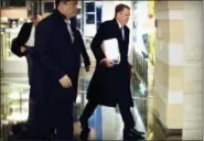  ?? MARK SCHIEFELBE­IN — THE ASSOCIATED PRESS ?? U.S. Trade Representa­tive Robert Lighthizer, right, arrives at his hotel Wednesday in Beijing. U.S. Treasury Secretary Steven Mnuchin and Lighthizer arrived in China’s capital on Tuesday to hold a new round of high-level trade talks with China on Feb. 14-15.