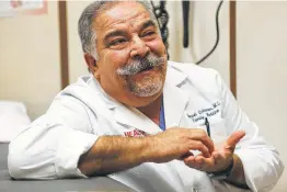  ?? William Luther / San Antonio Express-News ?? Dr. Manuel M. Quiñones tells his students, “It has to hurt you enough to cry,” when they deliver bad news to a patient, then go on to help the next patient.