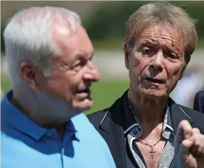  ??  ?? Upset by allegation­s...Paul Gambaccini with close friend Sir Cliff Richard