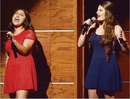  ?? Jerry Baker ?? Jasmine Andrade, left, and Alisa Pock performed during the Spring High Pop Show. The school received the Grammy Signature Schools Enterprise Award, which is given to schools that maintain high standards under financial challenges.