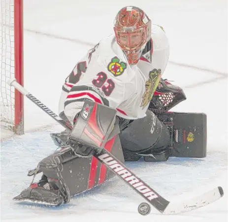  ?? | ADRIANWYLD/ AP ?? After trading Scott Darling, a pending unrestrict­ed free agent, to the Hurricanes, the Blackhawks are dangerousl­y thin in goal.