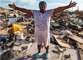  ??  ?? Grief: Aliana Alexis was left homeless when Dorian destroyed a shanty town called The Mudd on the island of Great Abaco