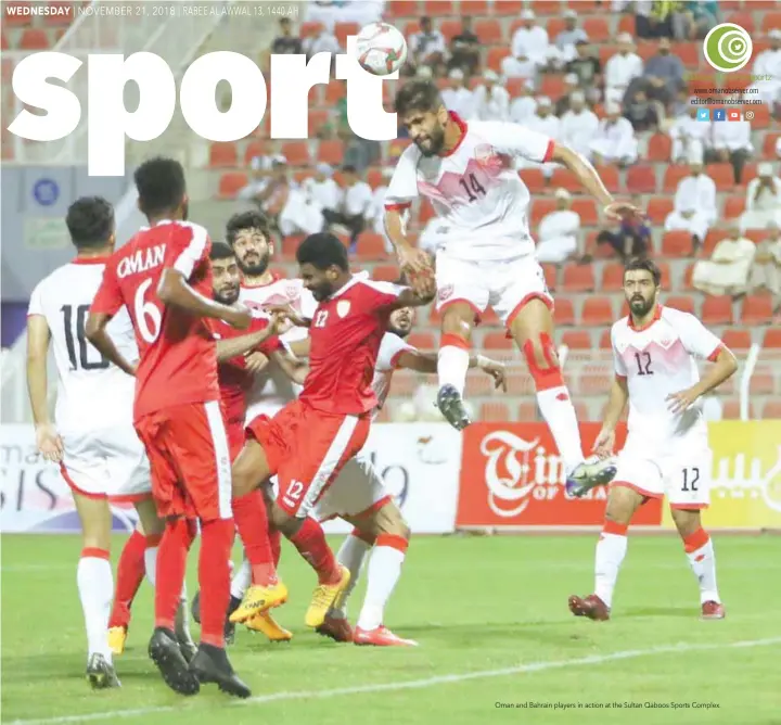  ??  ?? Oman and Bahrain players in action at the Sultan Qaboos Sports Complex.