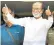  ??  ?? Rajinikant­h gives a thumbs-up to his supporters after announcing plans to launch his own political party