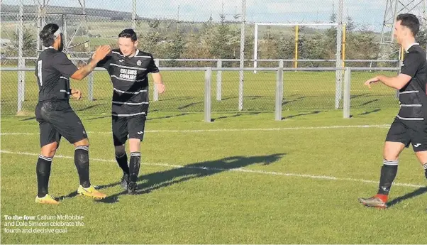  ??  ?? To the four Callum McRobbie and Dale Simeon celebrate the fourth and decisive goal