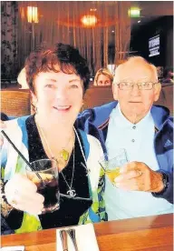  ??  ?? Happy couple Golden wedding pair Grace and Eric McLaren raise a glass to 50 years of marriage