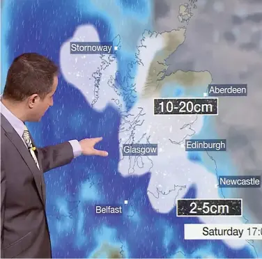  ??  ?? Gloomy forecast: The UK will be hit by a ‘snow curtain’ stretching for hundreds of miles