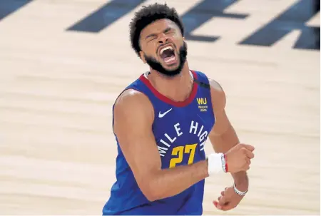  ?? Kevin C. Cox, Getty Images ?? It was another 50- point game for the Nuggets’ Jamal Murray who helped force a Game 7 in Denver’s first round series against the Utah Jazz on Sunday night.