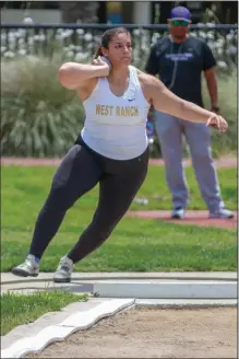  ?? Eddy Martinez/For The Signal ?? Natalie Ramirez, of West Ranch, throws 44-11.25 in the shot put event Saturday at the CIF-Southern Section Masters Meet.