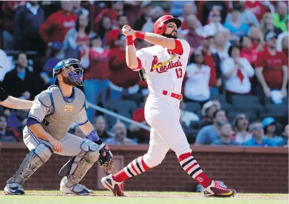  ?? — THE ASSOCIATED PRESS ?? St. Louis Cardinals first baseman Matt Carpenter crushed a grand slam in walk-off fashion Thursday in extra innings to punctuate an 8-4 victory over the Toronto Blue Jays in Game 1 of their doublehead­er at Busch Stadium. The Jays led 4-0 at one point.