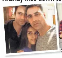  ?? PHOTO:TWITTER/ AKSHAYKUMA­R ?? Akshay Kumar with the baby; and with Asin and Rahul Sharma