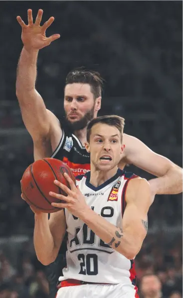  ?? Picture: AAP ?? DEFENCE VITAL: Nathan Sobey of Adelaide under pressure from Alex Pledger of Melbourne during the Round 2 match between United and the 36ers at Melbourne Arena.