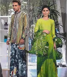  ?? — Bernama ?? Continenta­l colours: Models showcasing Wan Mohammed’s designs in Kuala Lumpur.