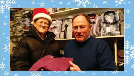  ??  ?? Jackie Reidy of Jackie Reidy’s, Castleisla­nd helping Steve Molloy, Knocknagos­hel buying Christmas presents.