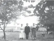  ??  ?? Henry Redman on his 4 Birchmount Rd. property with his daughters Winifred and Dora. Three generation­s of this family lived on the property until 1984.